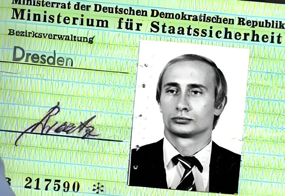 This image shows an East German Stasi identity card issued to a young Vladimir Putin during his time as a KGB officer.